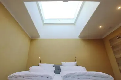 Ein Bett oder Betten in einem Zimmer der Unterkunft Ferienhaus Mond mit Sternenblick