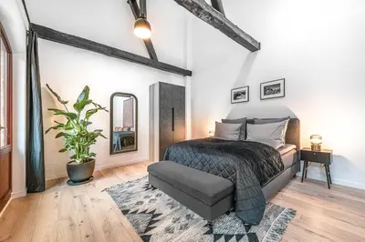 Ein Bett oder Betten in einem Zimmer der Unterkunft Mitte Loft group & family friendly, 150m2, 2BRs, 2Bathrooms, living & dinning room , 4 - 8 Guests