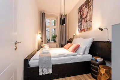 Ein Bett oder Betten in einem Zimmer der Unterkunft Trendy apartment at Ostkreuz