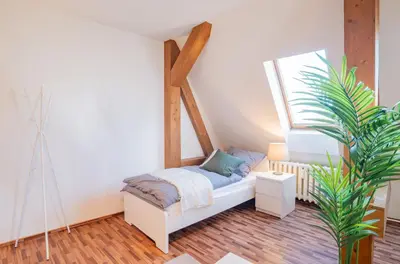 Ein Bett oder Betten in einem Zimmer der Unterkunft Spacious Apartment in Strausberg - Sleeps 6