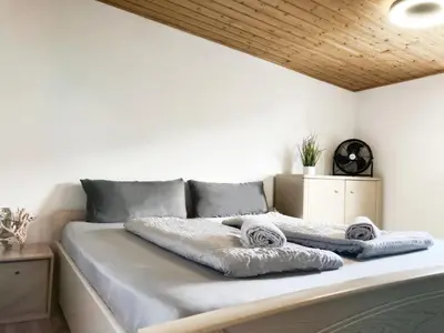 Ein Bett oder Betten in einem Zimmer der Unterkunft 3 Zimmer Haus nahe Airport BER