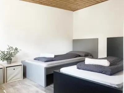 Ein Bett oder Betten in einem Zimmer der Unterkunft 3 Zimmer Haus nahe Airport BER