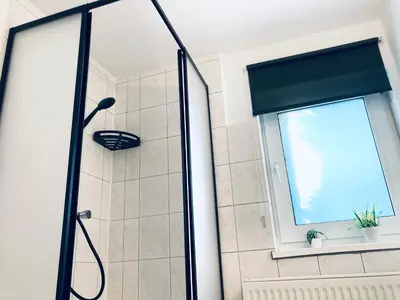 Ein Badezimmer in der Unterkunft 3 Zimmer Haus nahe Airport BER