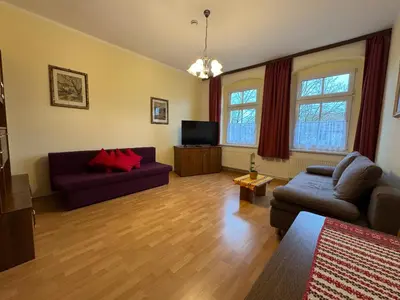 Ein Sitzbereich in der Unterkunft Pension Märkische Bauernstube