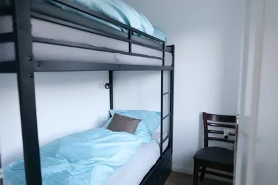 Ein Bett oder Betten in einem Zimmer der Unterkunft Komfort Ferienwohnung Altstadt Bad Belzig