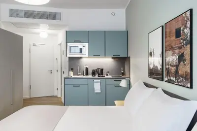 Küche/Küchenzeile in der Unterkunft Limehome Berlin Sybelstr