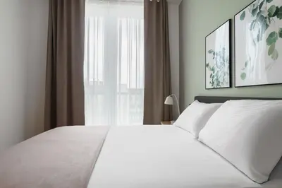 Ein Bett oder Betten in einem Zimmer der Unterkunft Limehome Berlin Sybelstr