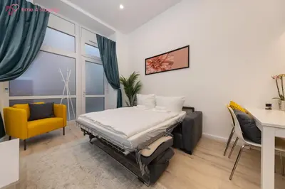 Ein Bett oder Betten in einem Zimmer der Unterkunft time4staying 3 SZ Maisonette nahe Kudamm, ICC & Zoo