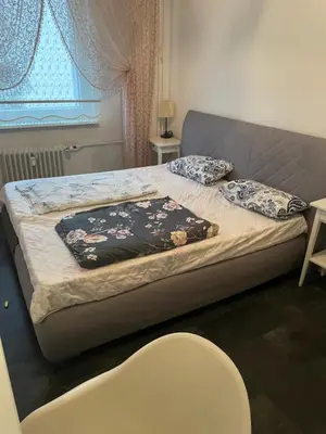 Ein Bett oder Betten in einem Zimmer der Unterkunft Two Rooms Berlin Neukölln