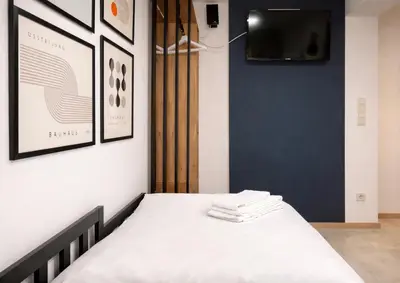 Ein Bett oder Betten in einem Zimmer der Unterkunft SOLO STUDIO by Comfort Housing
