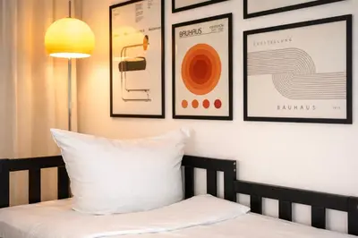 Ein Bett oder Betten in einem Zimmer der Unterkunft SOLO STUDIO by Comfort Housing