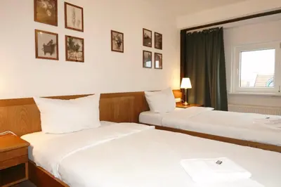Ein Bett oder Betten in einem Zimmer der Unterkunft LODGE by Comfort Housing - 2 bedroom apartment