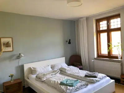 Ein Bett oder Betten in einem Zimmer der Unterkunft Charming Villa With A View Of Schermützelsee