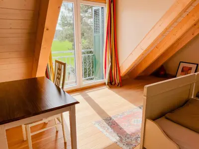 Ein Sitzbereich in der Unterkunft Oasis With Permaculture Garden And Yoga Space