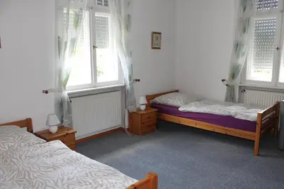 Ein Bett oder Betten in einem Zimmer der Unterkunft Ferienwohnungen Heiliger See Potsdam