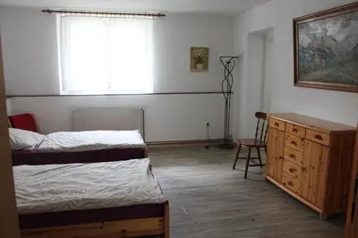 Ein Bett oder Betten in einem Zimmer der Unterkunft Ferienwohnungen Heiliger See Potsdam