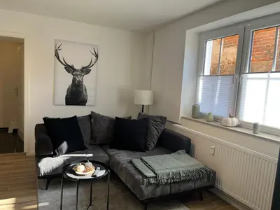 Ein Sitzbereich in der Unterkunft Gutshof von Gemünden Ferienwohnung 2