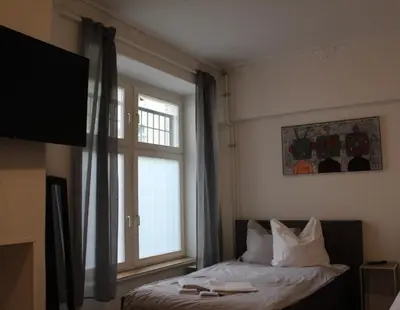 Ein Bett oder Betten in einem Zimmer der Unterkunft Appartement im Szenekiez