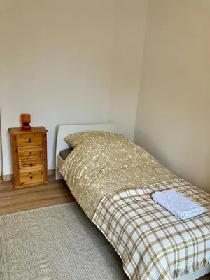 Ein Bett oder Betten in einem Zimmer der Unterkunft FeWo Versteck am Hug