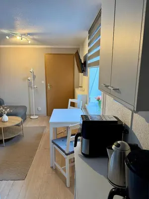 Ein Sitzbereich in der Unterkunft Ferienwohnung Rheinsberg in Schlossnähe