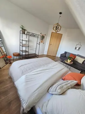 Ein Bett oder Betten in einem Zimmer der Unterkunft Cozy house and free parking