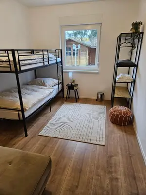 Ein Bett oder Betten in einem Zimmer der Unterkunft Cozy house and free parking