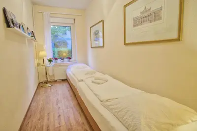 Ein Bett oder Betten in einem Zimmer der Unterkunft Holiday Berlin Apartments