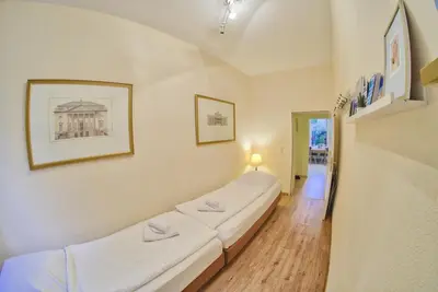 Ein Bett oder Betten in einem Zimmer der Unterkunft Holiday Berlin Apartments