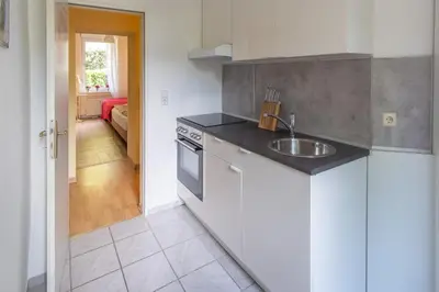 Küche/Küchenzeile in der Unterkunft Holiday Berlin Apartments