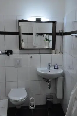 Ein Badezimmer in der Unterkunft Charlotten Apartments am Ku'damm