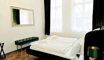 Ein Bett oder Betten in einem Zimmer der Unterkunft Green Apartment 3-room Treptower Park