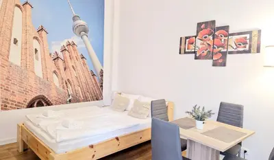 Ein Bett oder Betten in einem Zimmer der Unterkunft Green Apartment KM1 Small two-room apartment with terrace