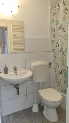 Ein Badezimmer in der Unterkunft Green Apartment KM1 Small two-room apartment with terrace