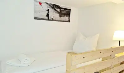 Ein Bett oder Betten in einem Zimmer der Unterkunft Green Apartment KM2 XL Studio with terrace