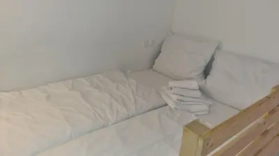 Ein Bett oder Betten in einem Zimmer der Unterkunft Green Apartment KM3 Studio with terrace