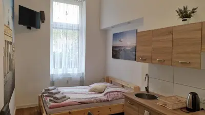Ein Bett oder Betten in einem Zimmer der Unterkunft Green Apartment KM4 Studio with terrace