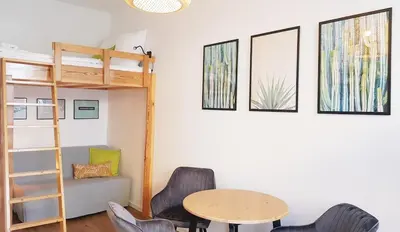 Ein Bett oder Betten in einem Zimmer der Unterkunft Green Apartment N40 Cosy Studio for 3 guests, Terrace