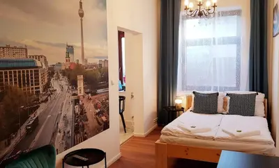 Ein Bett oder Betten in einem Zimmer der Unterkunft Green Apartment Studio L29 Neukölln