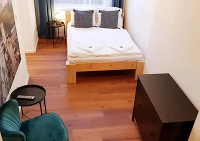 Ein Bett oder Betten in einem Zimmer der Unterkunft Green Apartment Studio L29 Neukölln