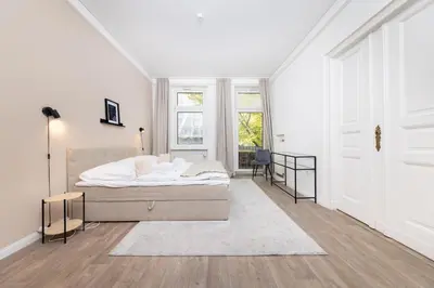 Ein Bett oder Betten in einem Zimmer der Unterkunft 4 Zimmer Große Küche Balkon am Maybachufer