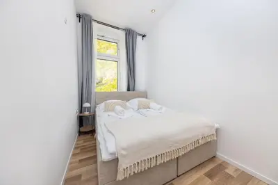 Ein Bett oder Betten in einem Zimmer der Unterkunft 4 Zimmer Große Küche Balkon am Maybachufer