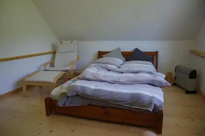 Ein Bett oder Betten in einem Zimmer der Unterkunft Schwalbenhaus-Netzow