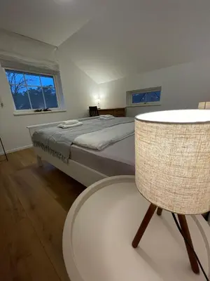 Ein Bett oder Betten in einem Zimmer der Unterkunft Stilvolles Naturidyll bei Berlin