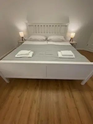 Ein Bett oder Betten in einem Zimmer der Unterkunft Stilvolles Naturidyll bei Berlin