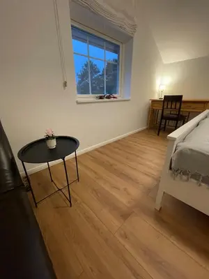 Ein Bett oder Betten in einem Zimmer der Unterkunft Stilvolles Naturidyll bei Berlin