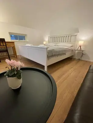 Ein Bett oder Betten in einem Zimmer der Unterkunft Stilvolles Naturidyll bei Berlin