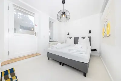 Ein Bett oder Betten in einem Zimmer der Unterkunft Great 3-room apartment