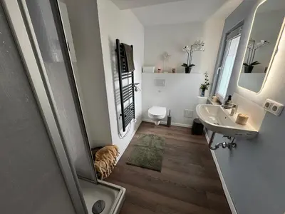 Ein Badezimmer in der Unterkunft Wohnung mit Garten und Terrasse für 7 Personen