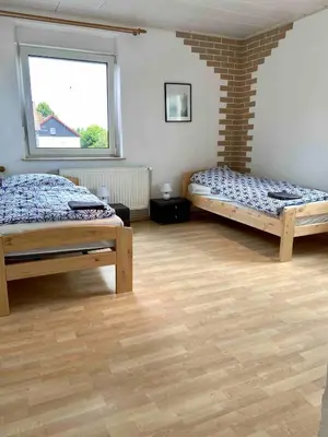 Ein Bett oder Betten in einem Zimmer der Unterkunft Monteurzimmer Apartment in Müncheberg