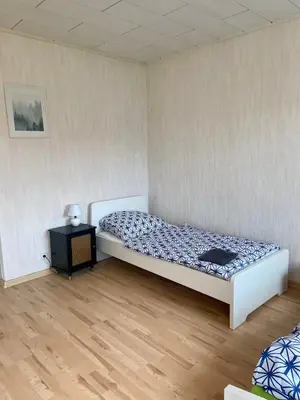Ein Bett oder Betten in einem Zimmer der Unterkunft Monteurzimmer Apartment in Müncheberg